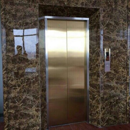 Ốp mặt thang máy bằng đá marble Dark Emperador